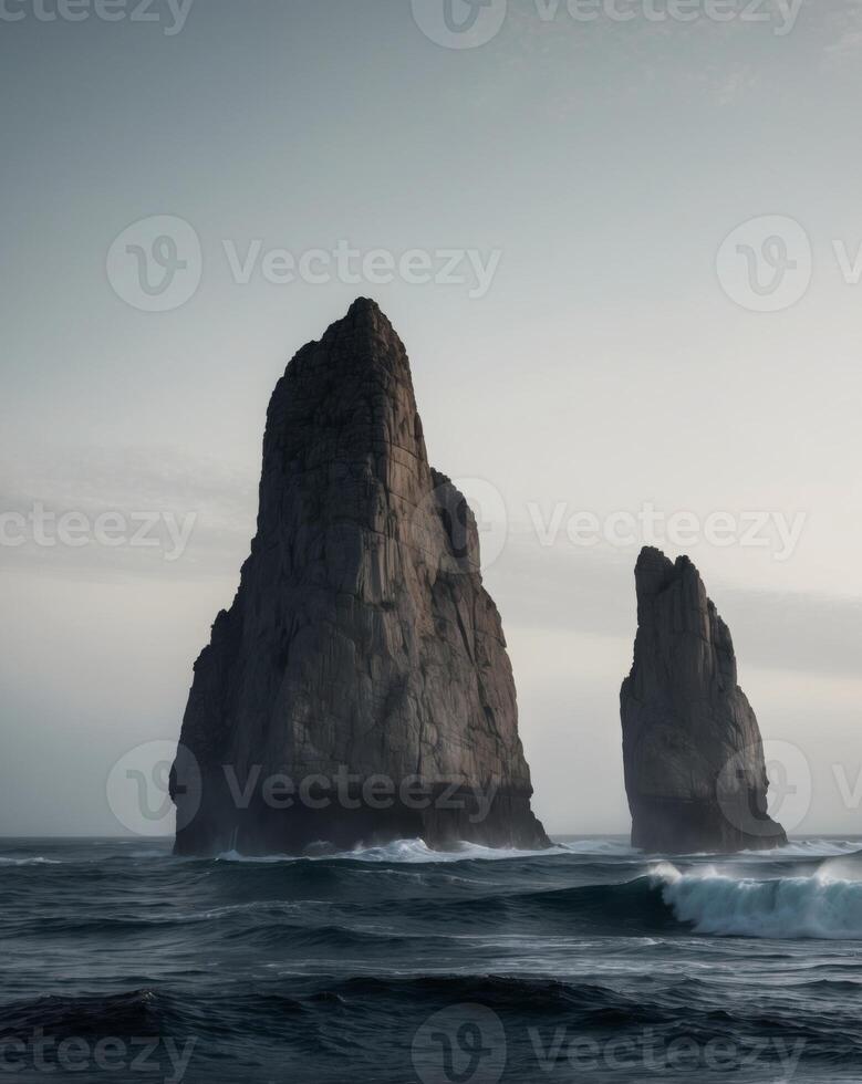 Dark Ocean Scene with Towering Rock Formations. photo
