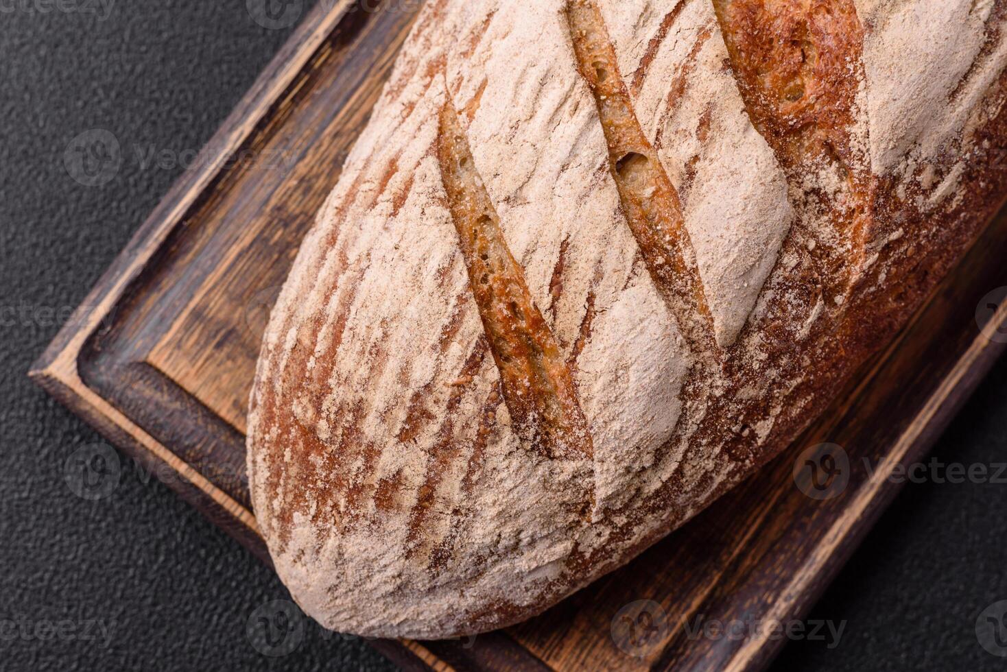 Brown bread with seeds, grains, salt and spices photo