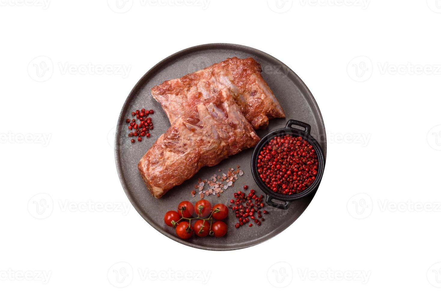 Pork ribs in sweet and sour sauce with salt and spices photo