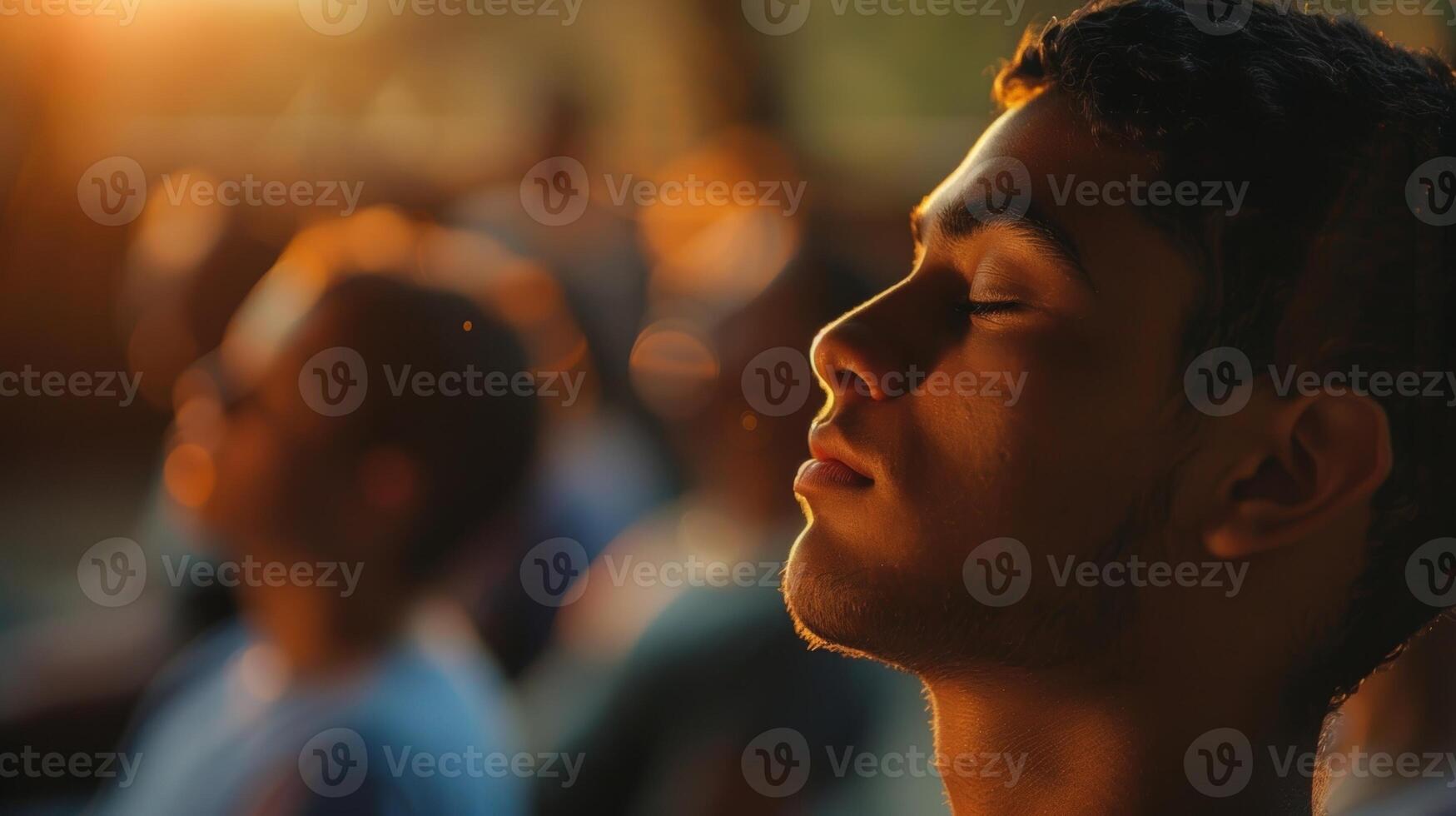 A peaceful expression on the persons face as they listen to the guided meditation freeing their mind from any distractions photo