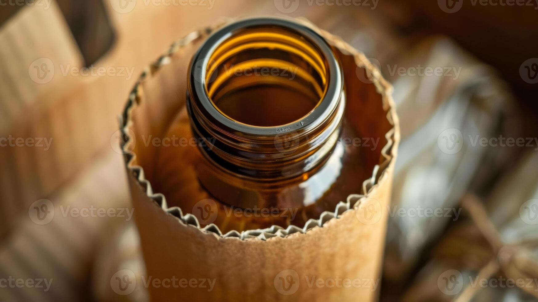 A cardboard sleeve snugly hugs a glass bottle displaying the companys commitment to sustainable packaging practices photo