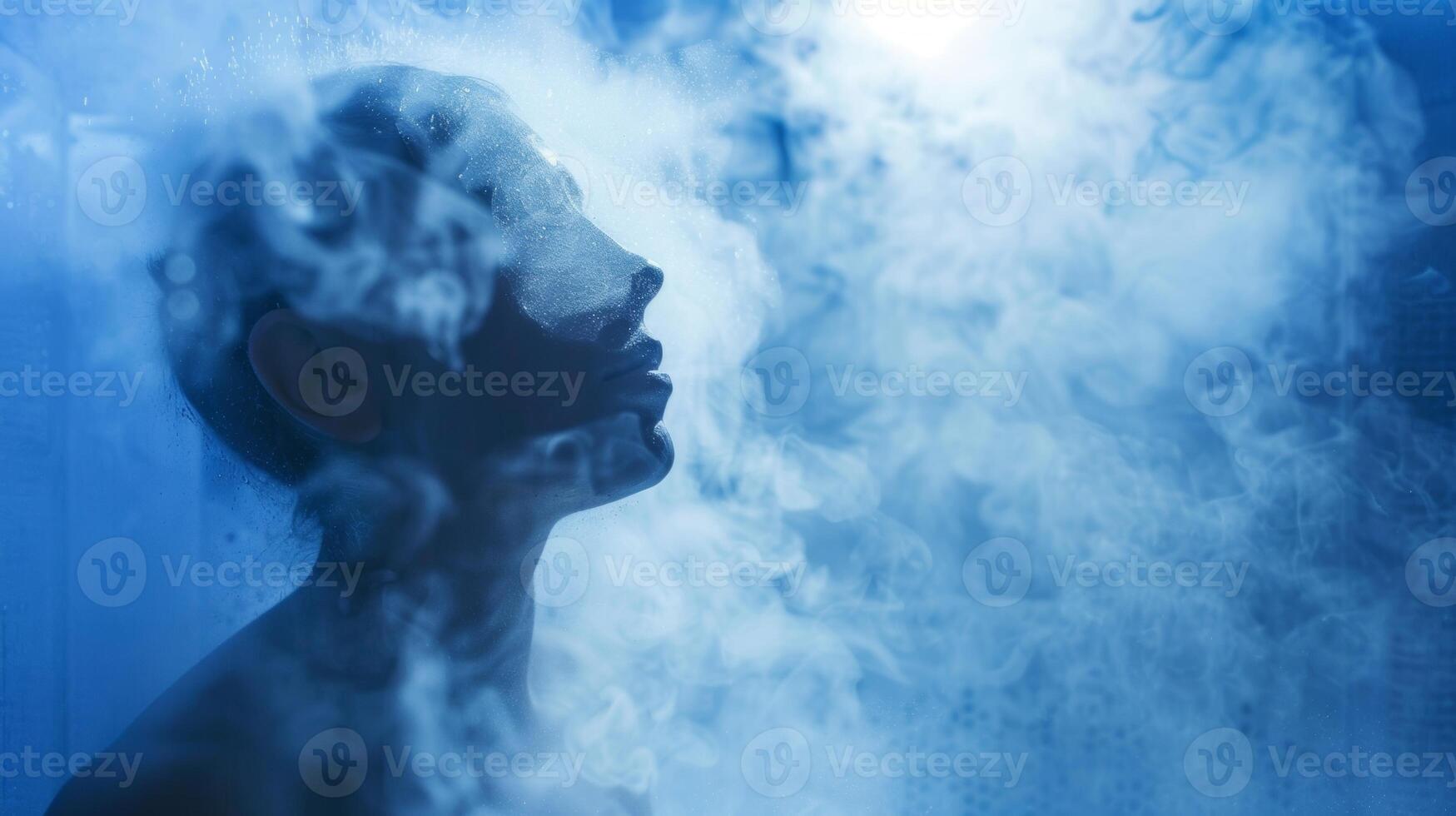 The air inside the cryotherapy chamber is filled with a wintry chill as a person stands tall feeling the rejuvenating effects of the cold mist on their skin photo