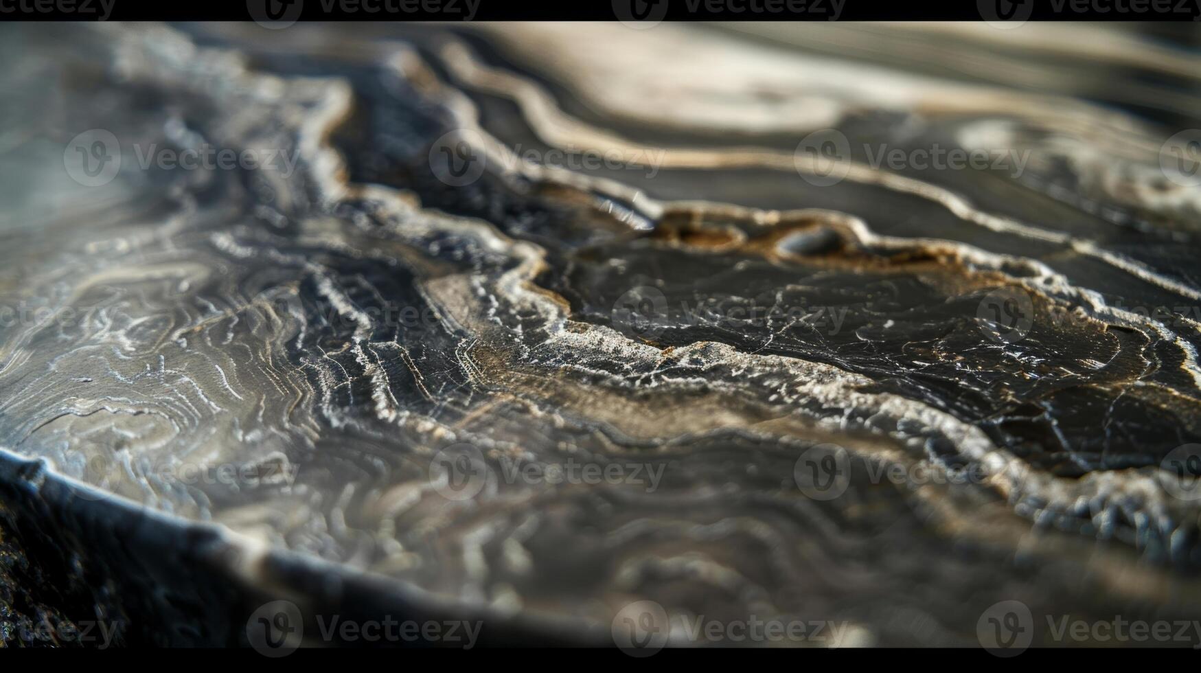 The closeup of this natural stone countertop exposes its organic layers ranging from soft and velvety to grainy and co all blending together into a harmonious and unique surface photo