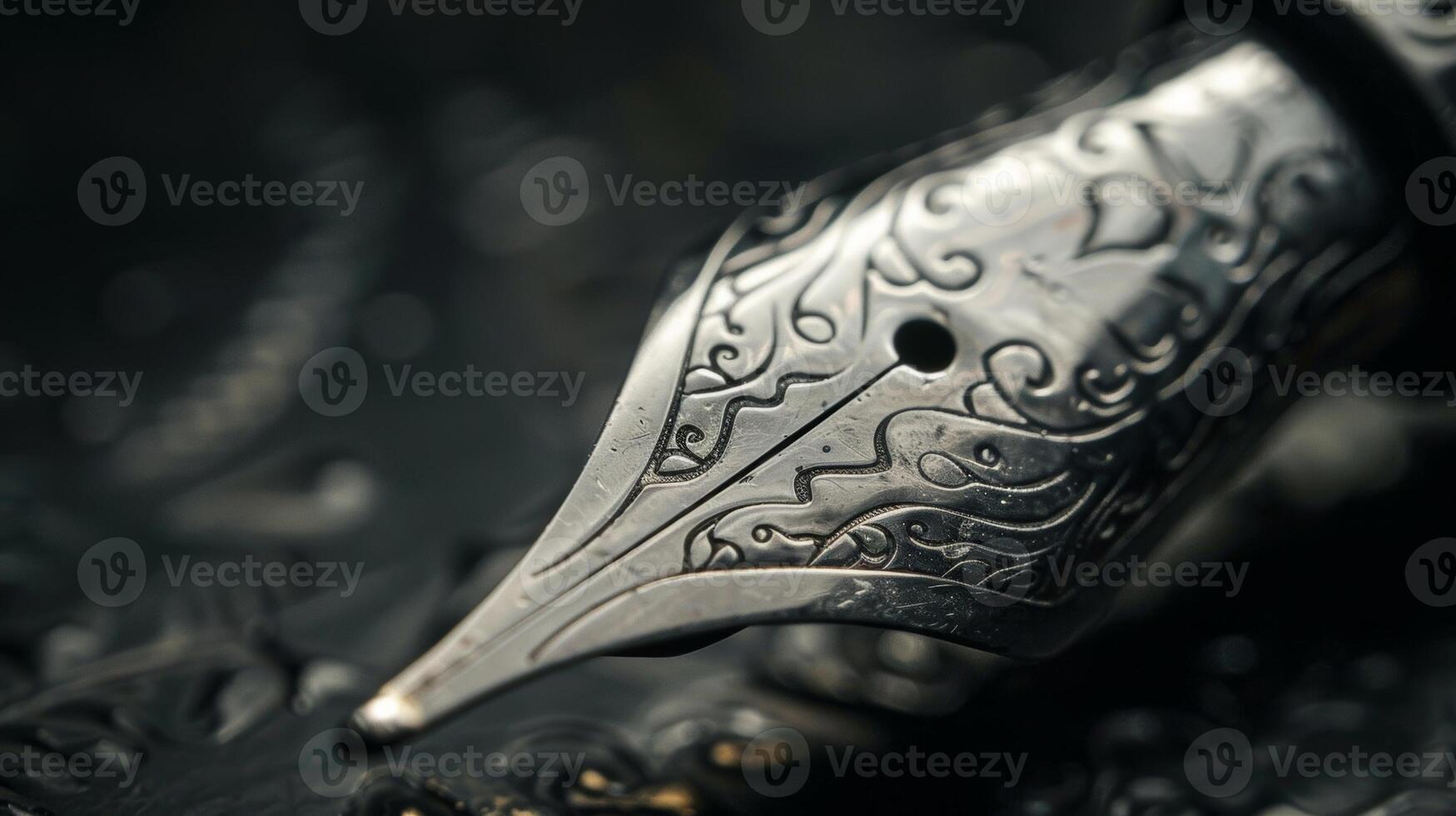 A macro shot of a classic fountain pen tip revealing the delicate etchings and smooth curvature photo