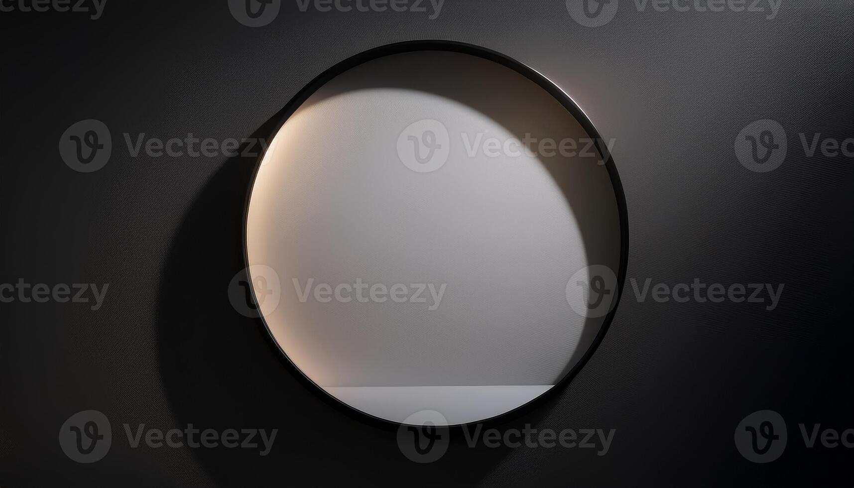 A minimalist circular wall light casting a soft, ambient glow against a dark textured background, highlighting its sleek modern design. photo