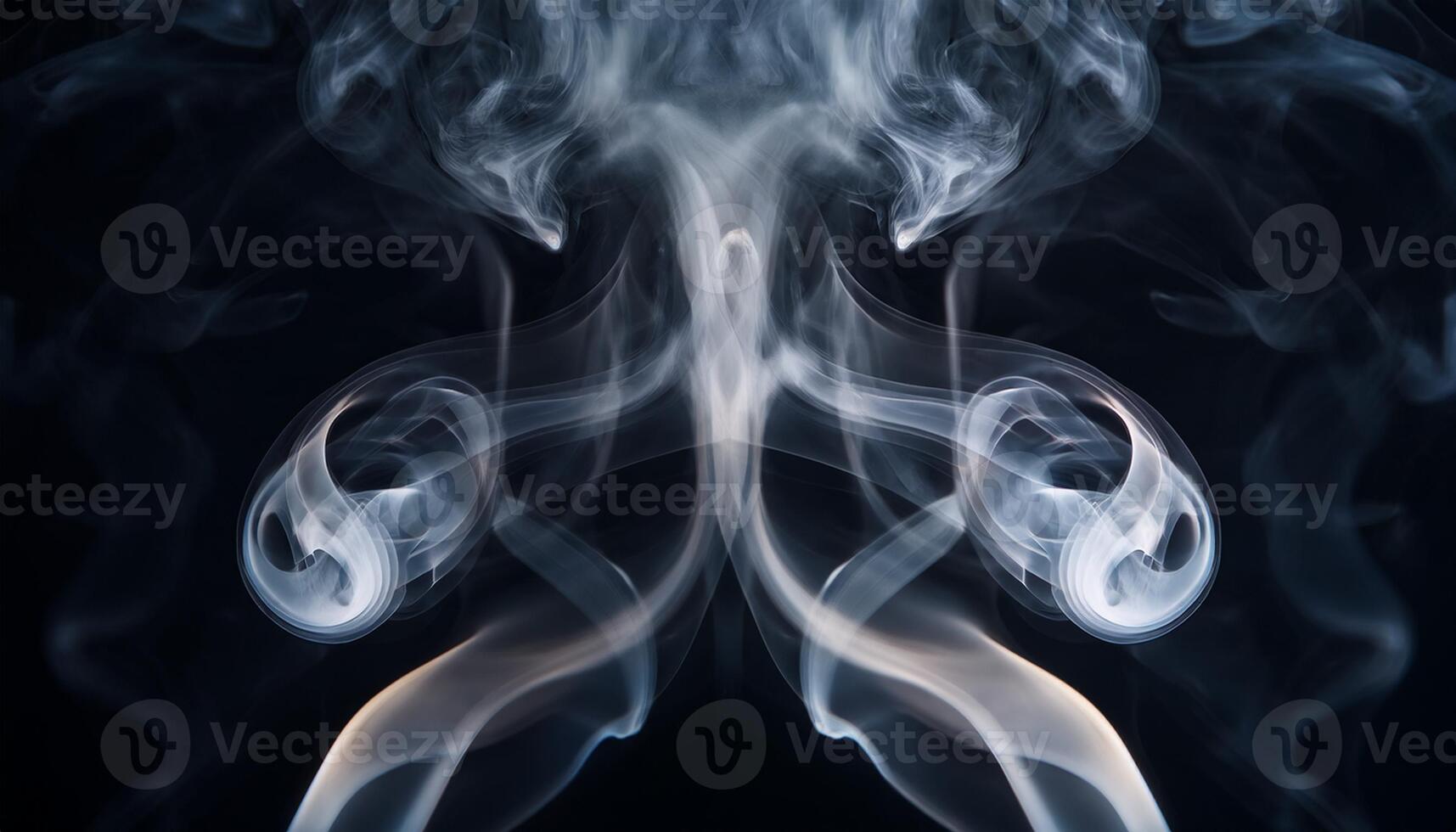 An abstract image of swirling white smoke against a dark background, creating intricate, symmetrical shapes and ethereal patterns. photo