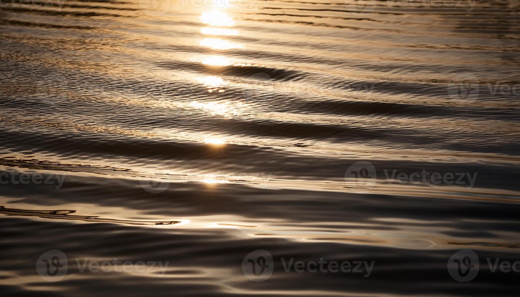 Serene image of sunlight reflecting on gentle water ripples, creating a peaceful and warm ambiance with golden tones. photo