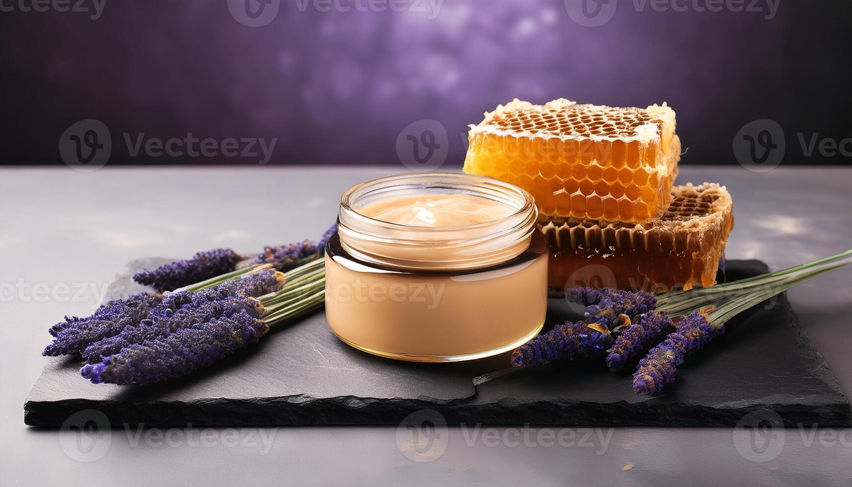 A jar of honey lavender cream surrounded by fresh lavender sprigs and honeycomb, promoting natural skincare and soothing properties. photo
