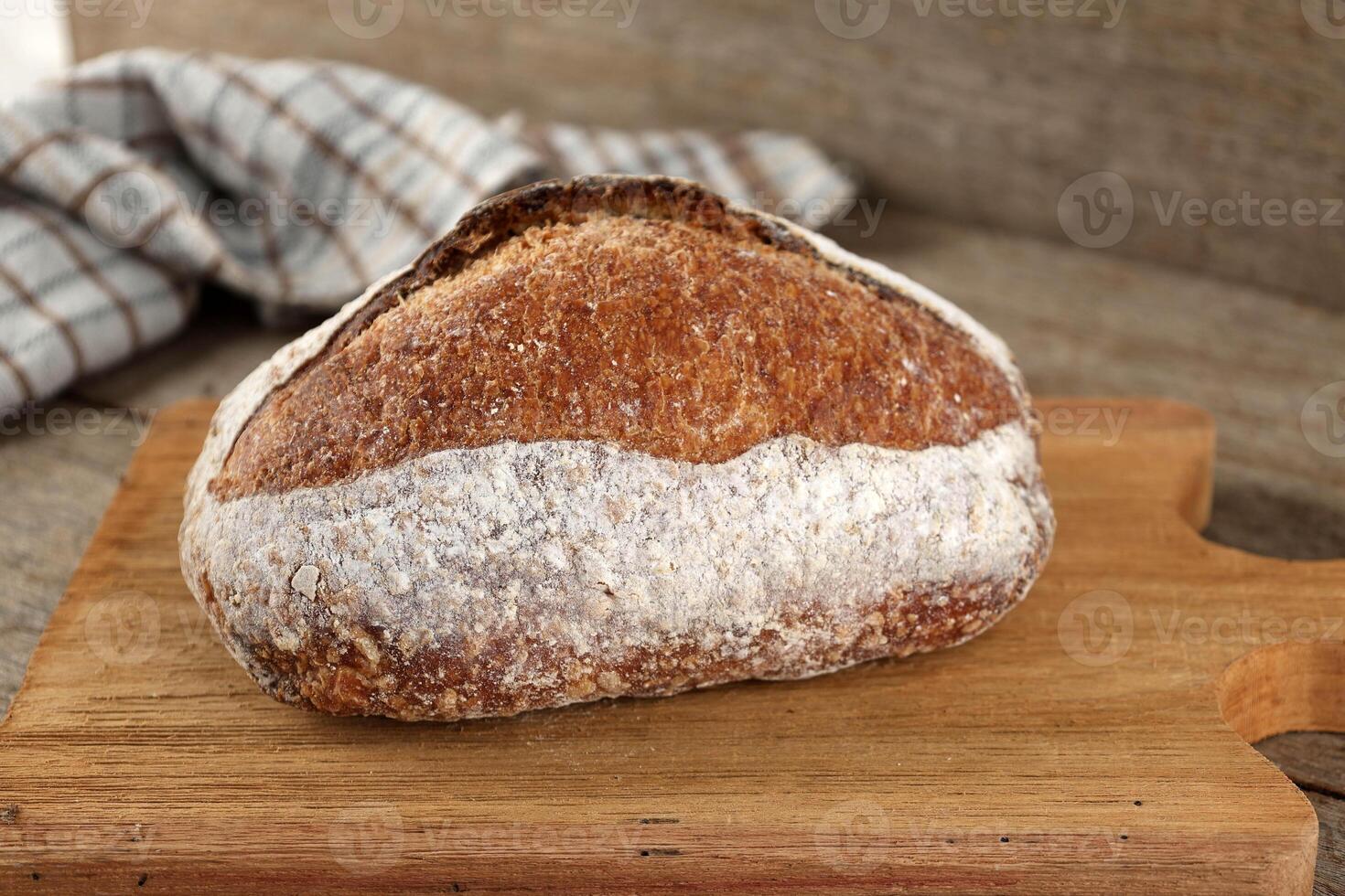 Fresh Baked Sourdough Bread with Beatiful Scoring photo
