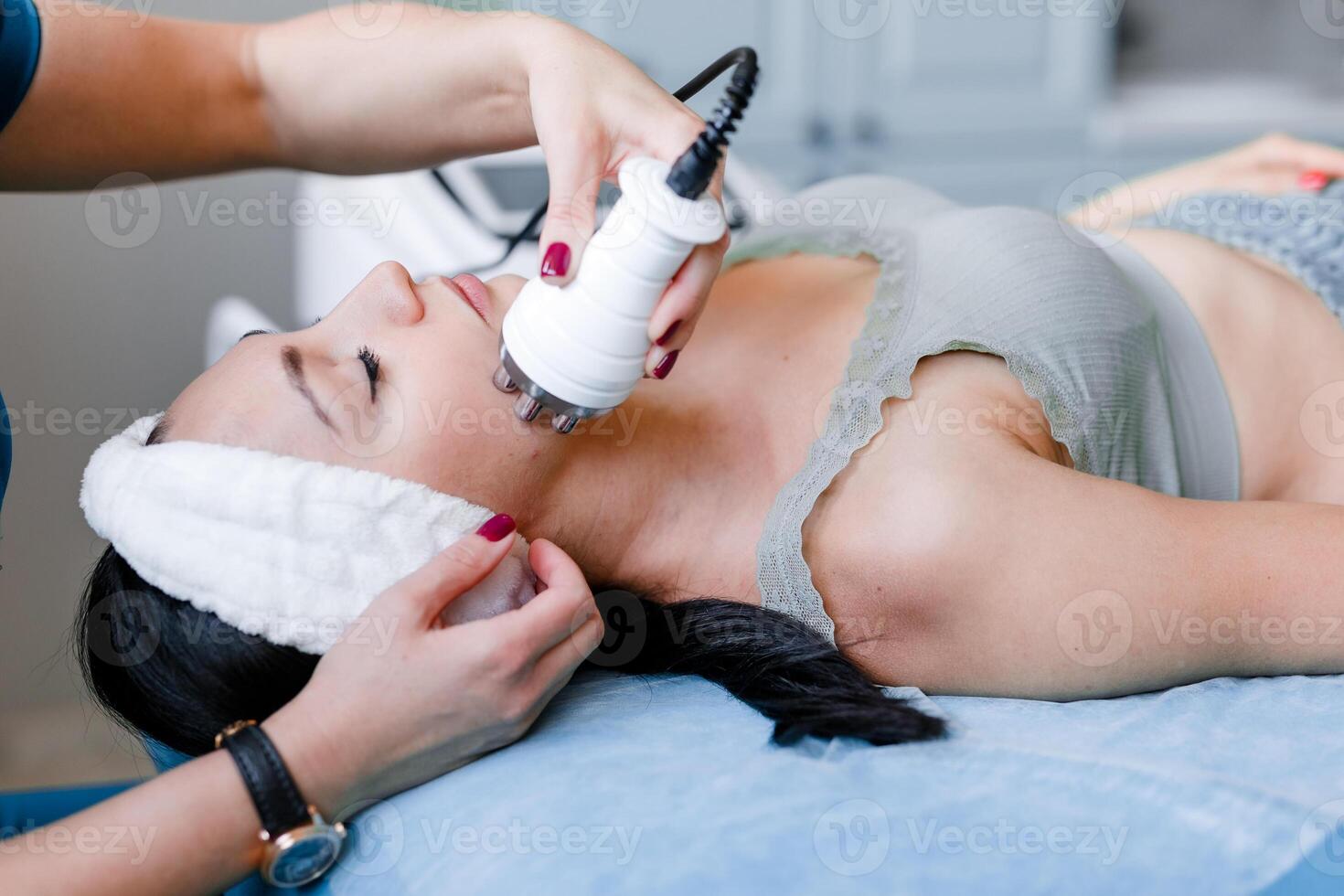 Skin Revitalization Woman Enjoying Cosmetic Skin Treatments photo