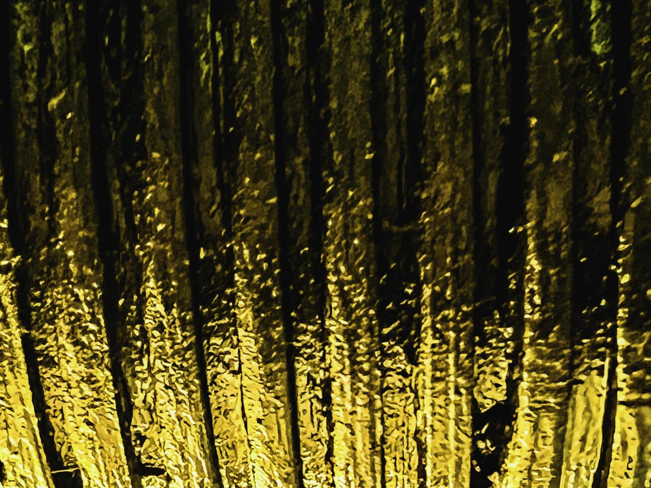 Blurred background of worm gear coated with engine oil and grease,old and rough texture photo