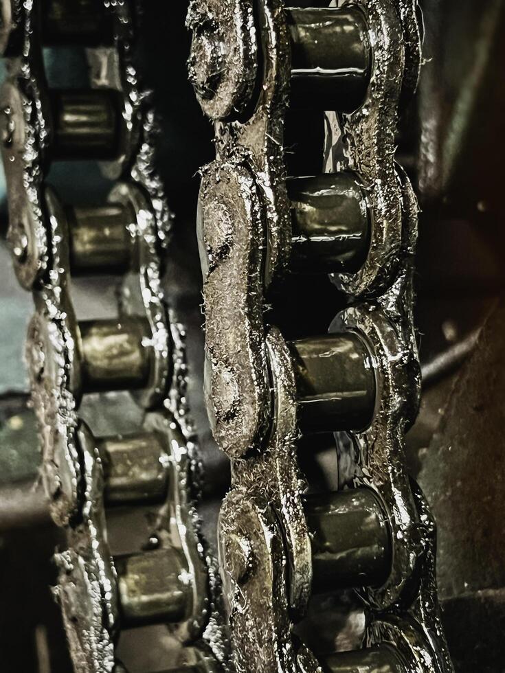 dirty and wet of Bearing belt and chain lubricant with grease and oil,motivate machine, photo