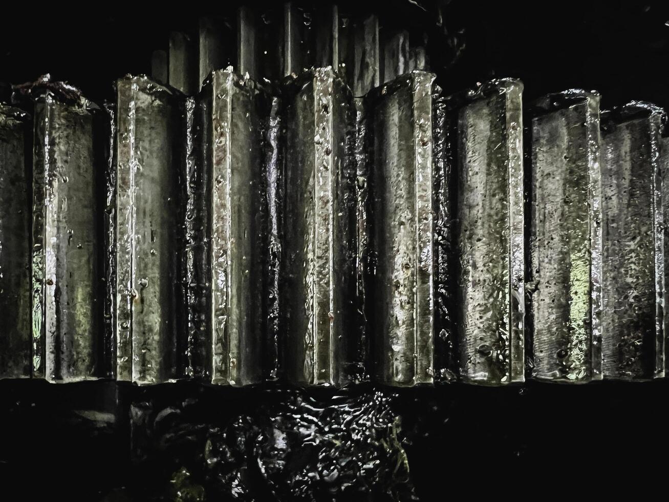 Cogwheel and worm gear lubricant with grease,part of machine in factory photo