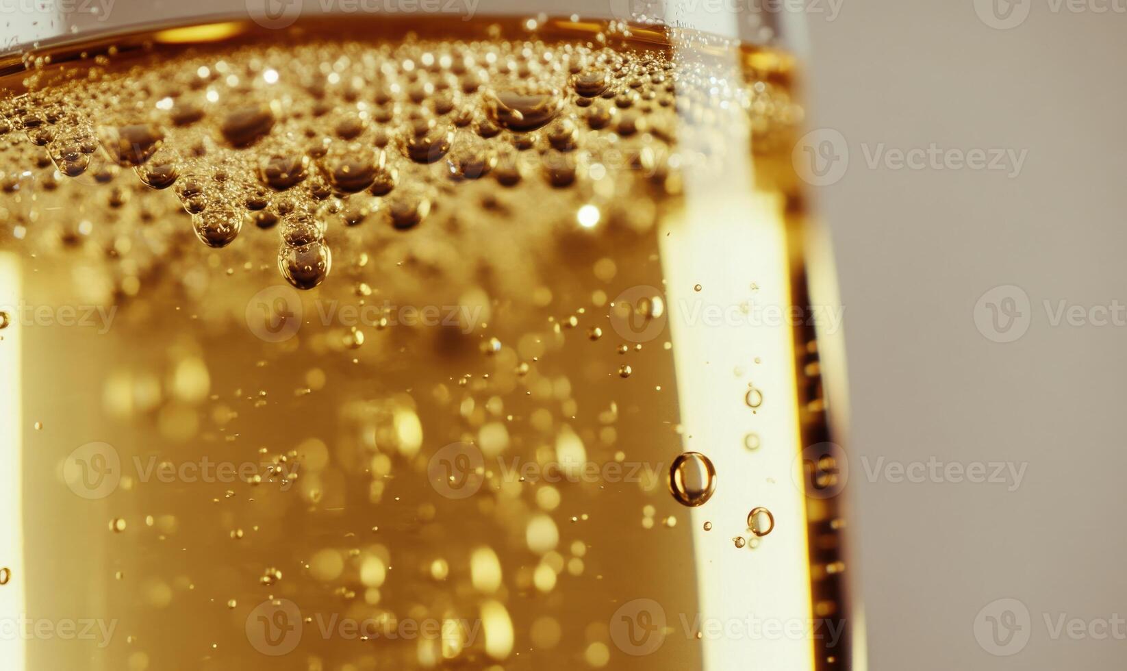 A glass of liquid with bubbles in it photo