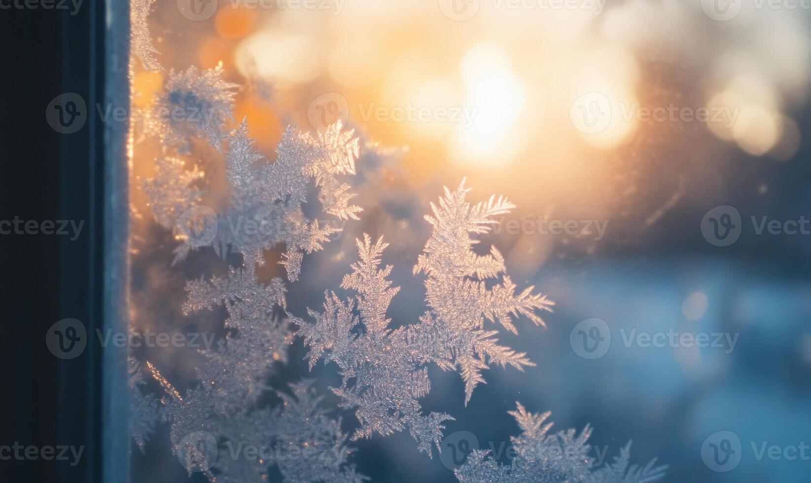 A window pane with frosted glass and a snowflake on it photo