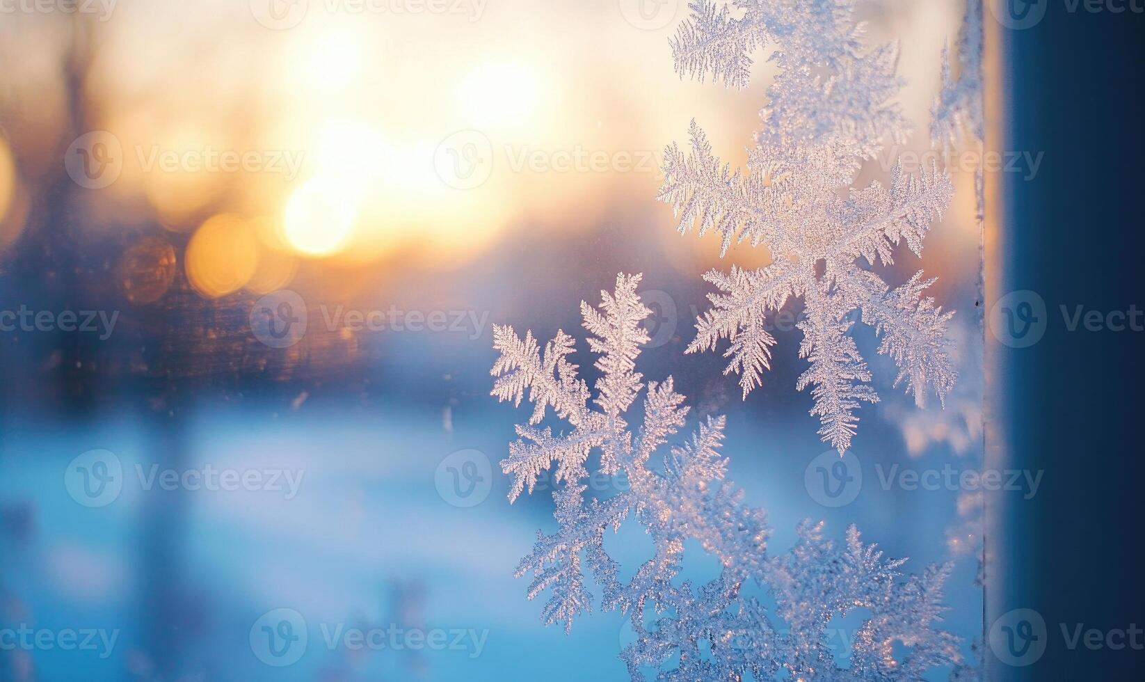 A window pane with snowflakes on it photo