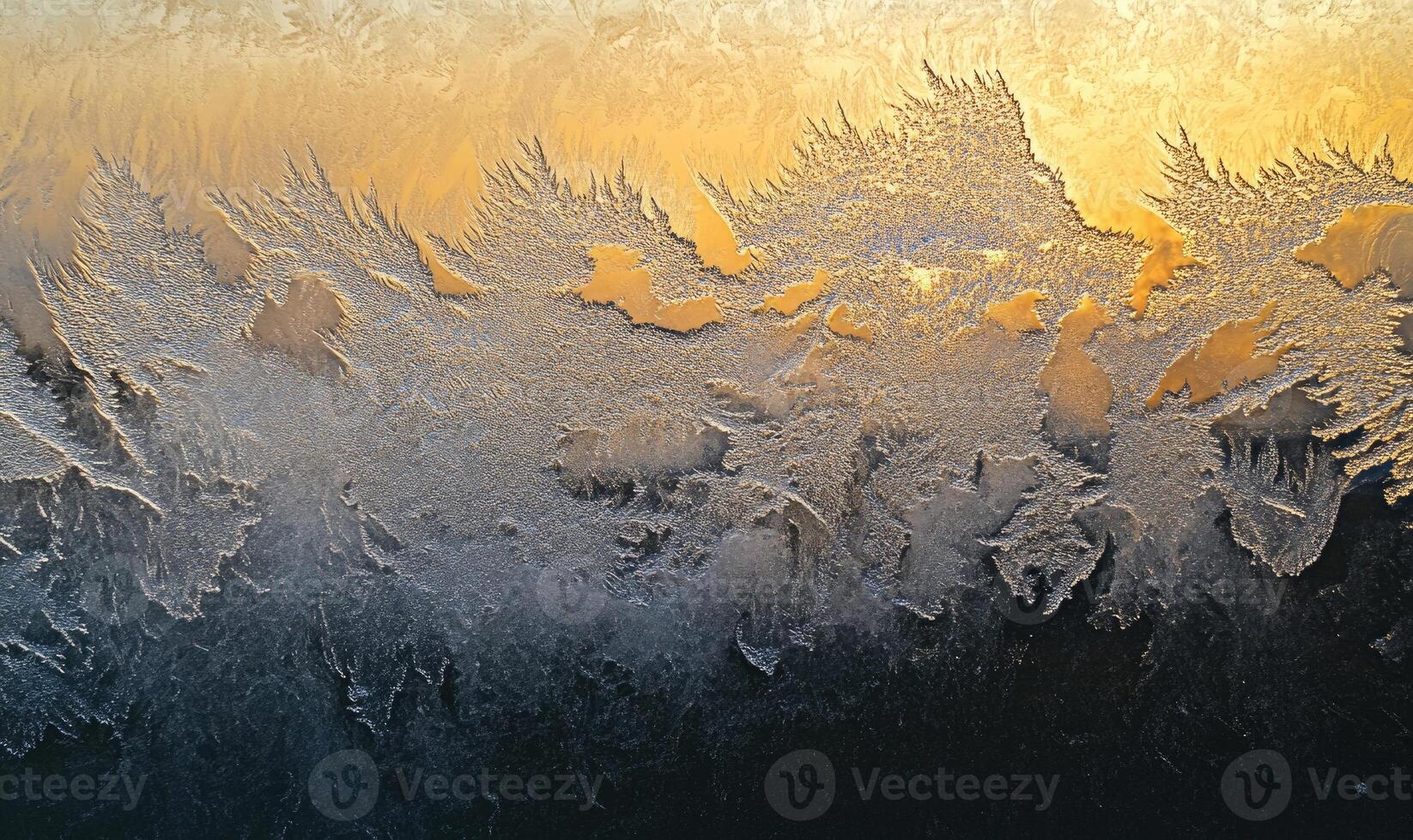 A frosty window pane with a frosty pattern photo