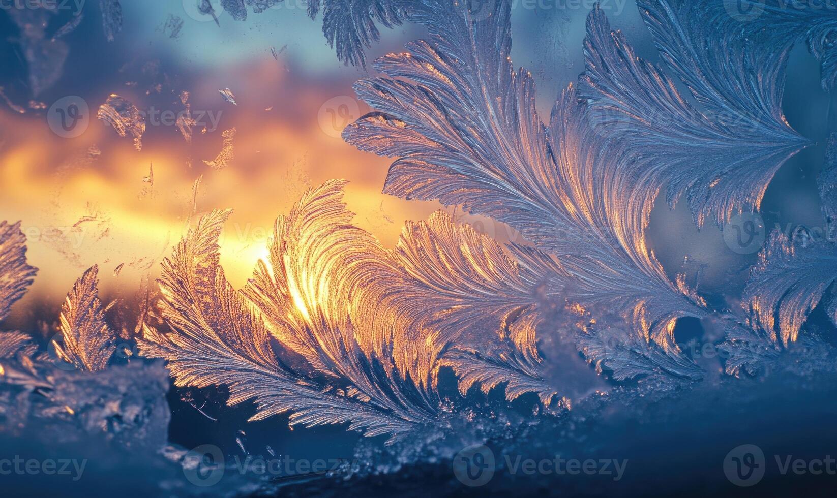 A frosty window pane with a sun shining through it photo