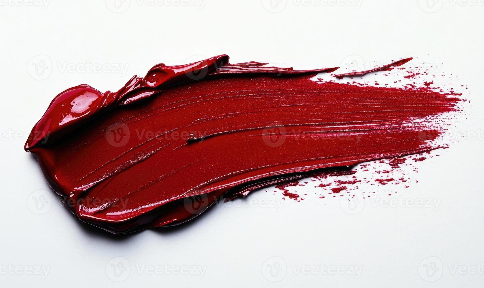 A red brush stroke on a white background photo