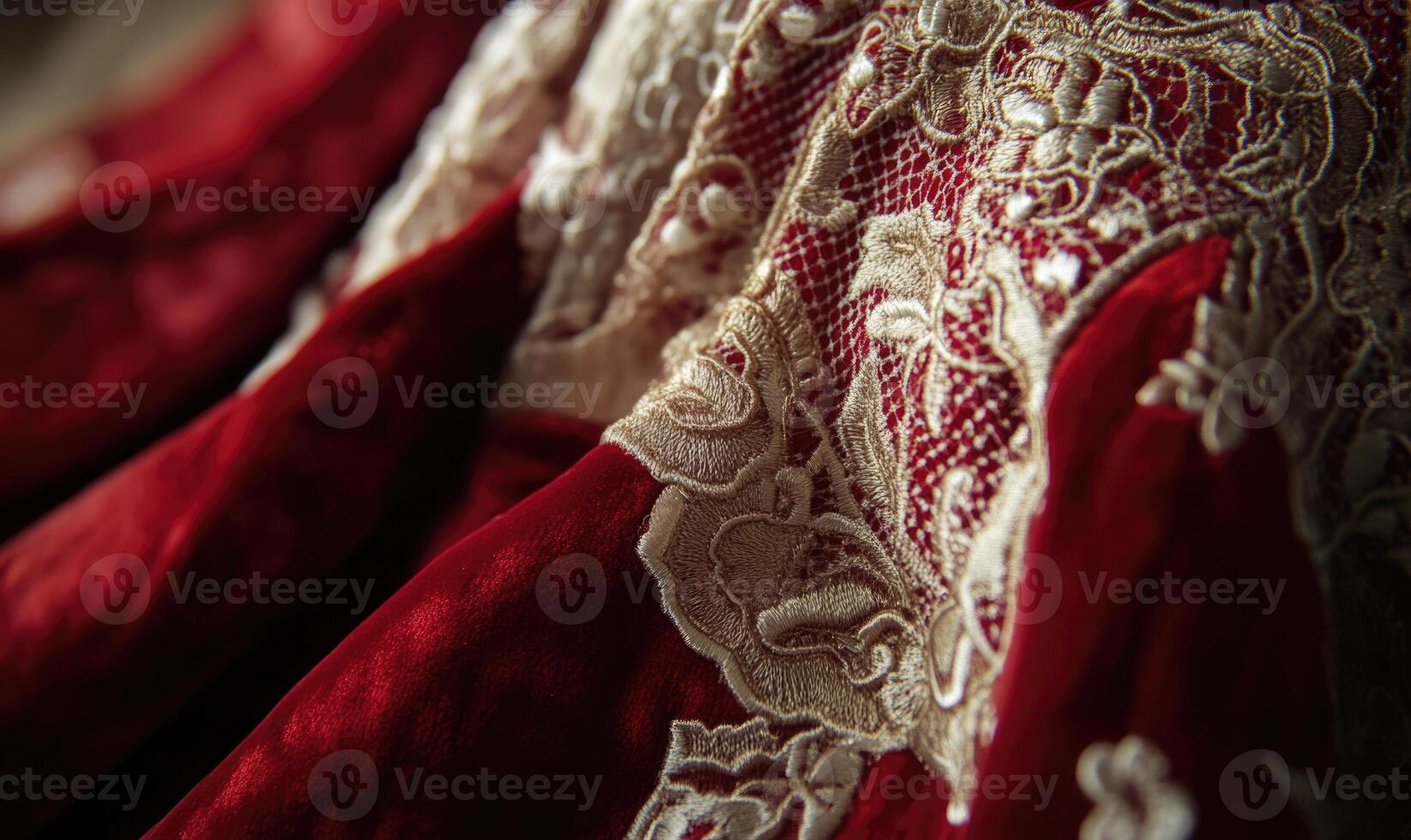 A red dress with gold embroidery and lace photo