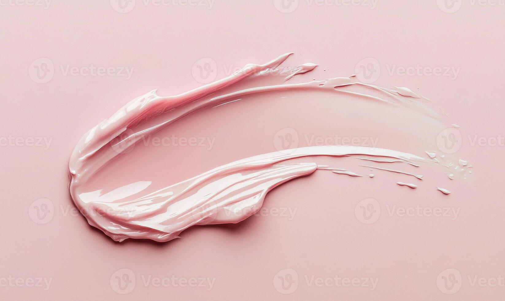 A pink cream splashed on a pink background photo