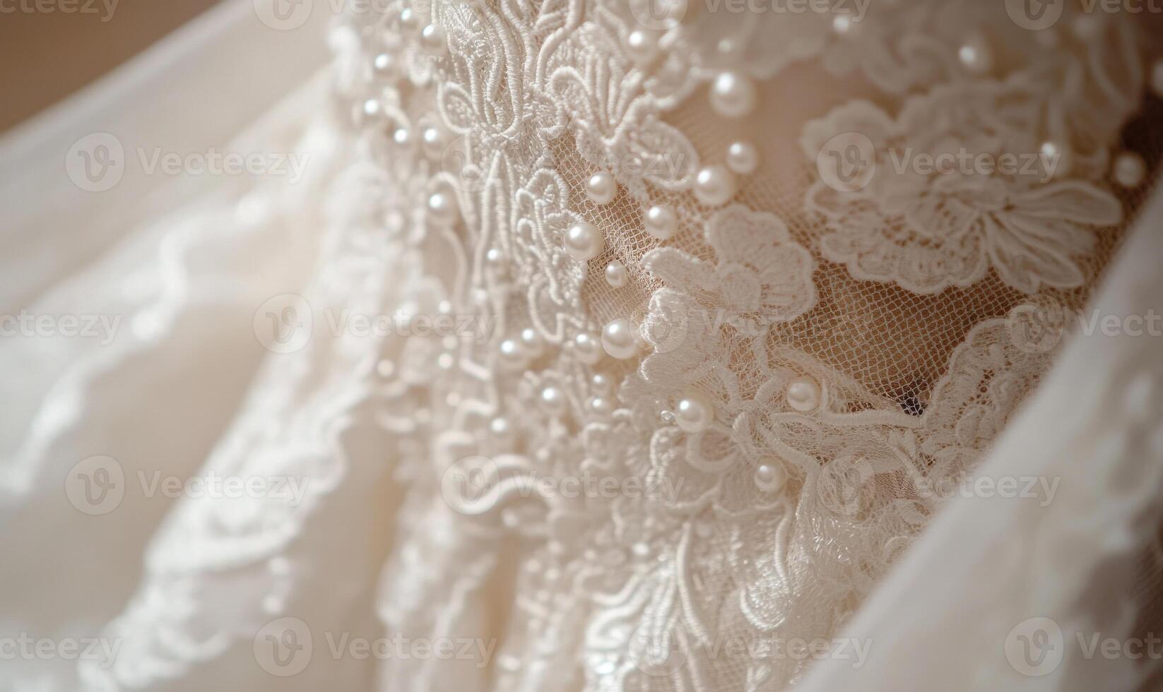 A white lace dress with pearls on it photo
