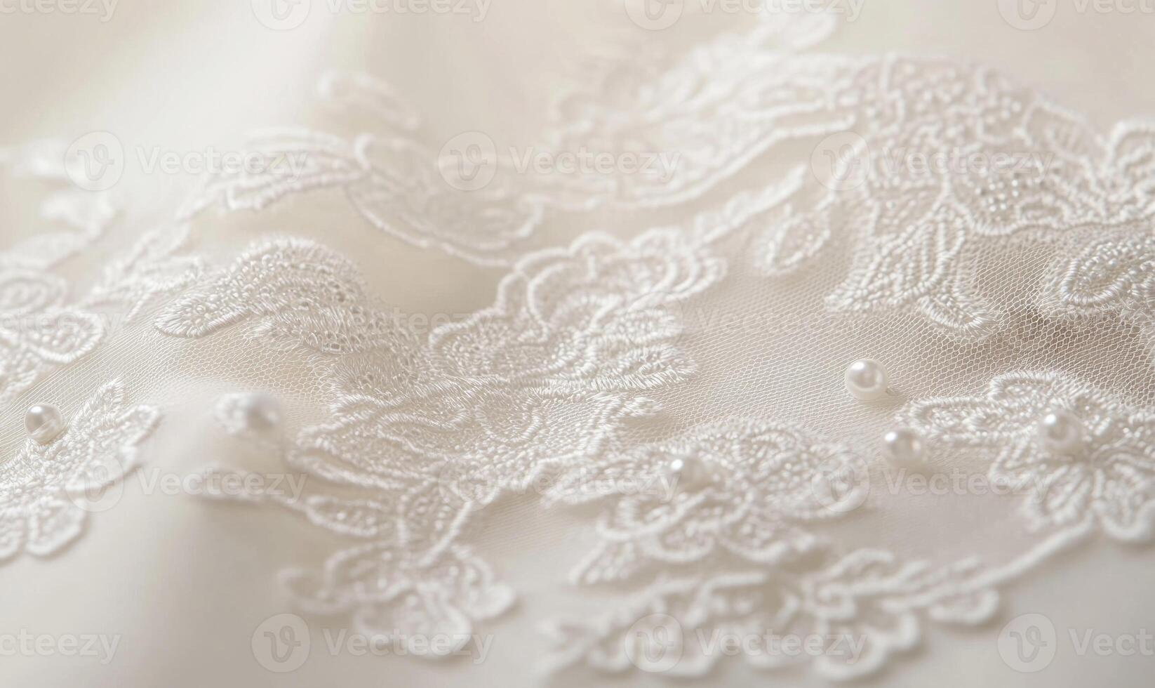 A close up of a white lace with flowers and pearls photo