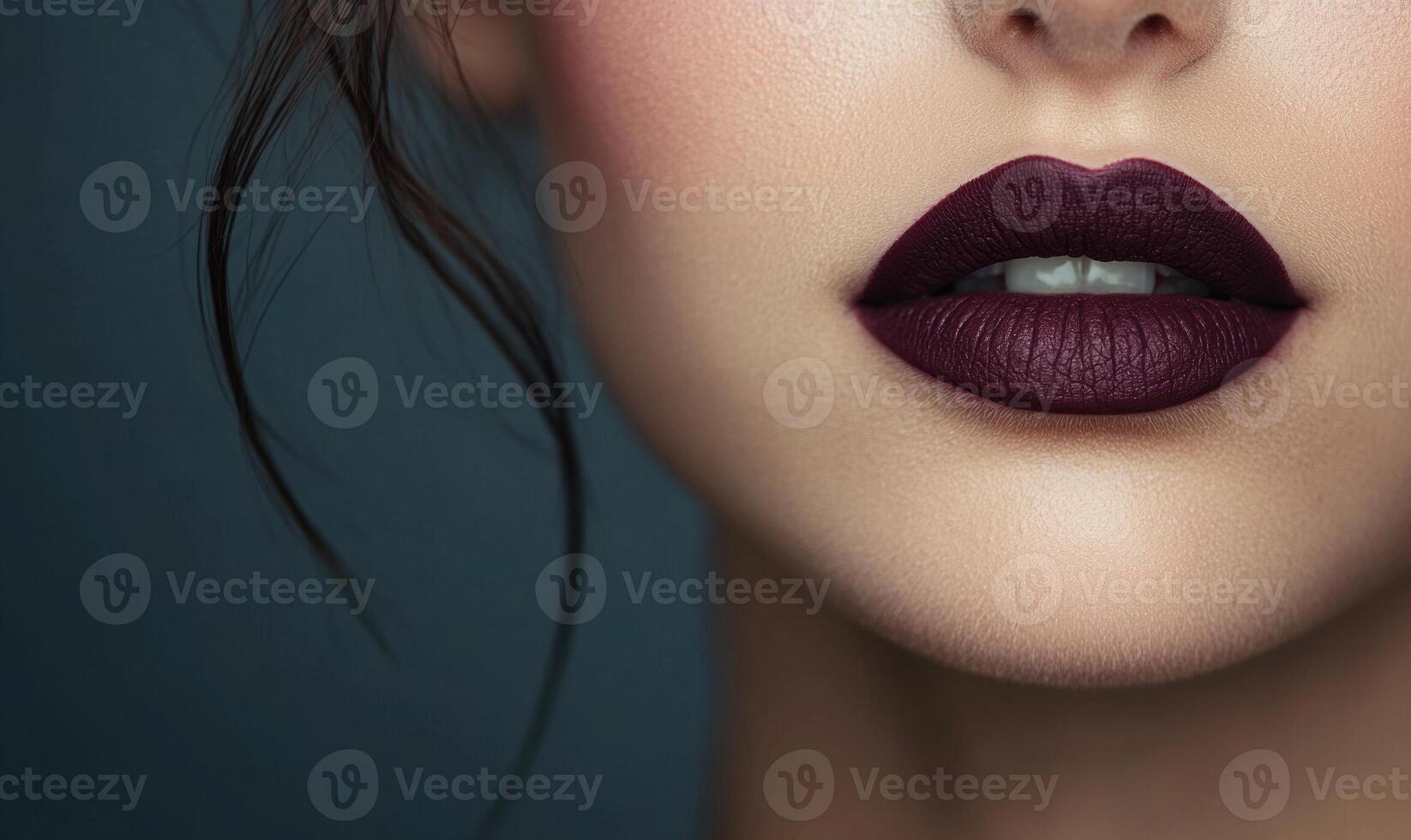 A woman with a purple lip is shown in a close up photo