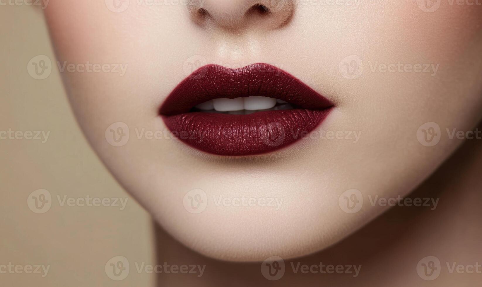 A woman's lips are painted red with a shiny finish photo