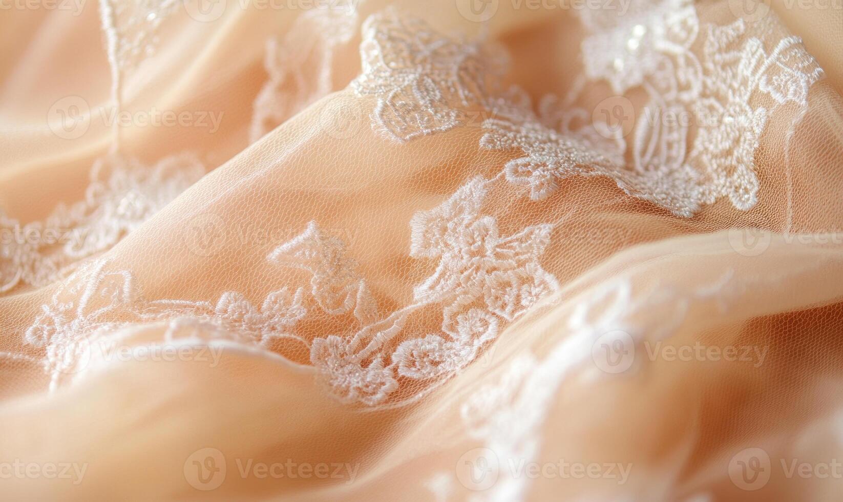 A close up of a white lace fabric with a pattern of flowers photo