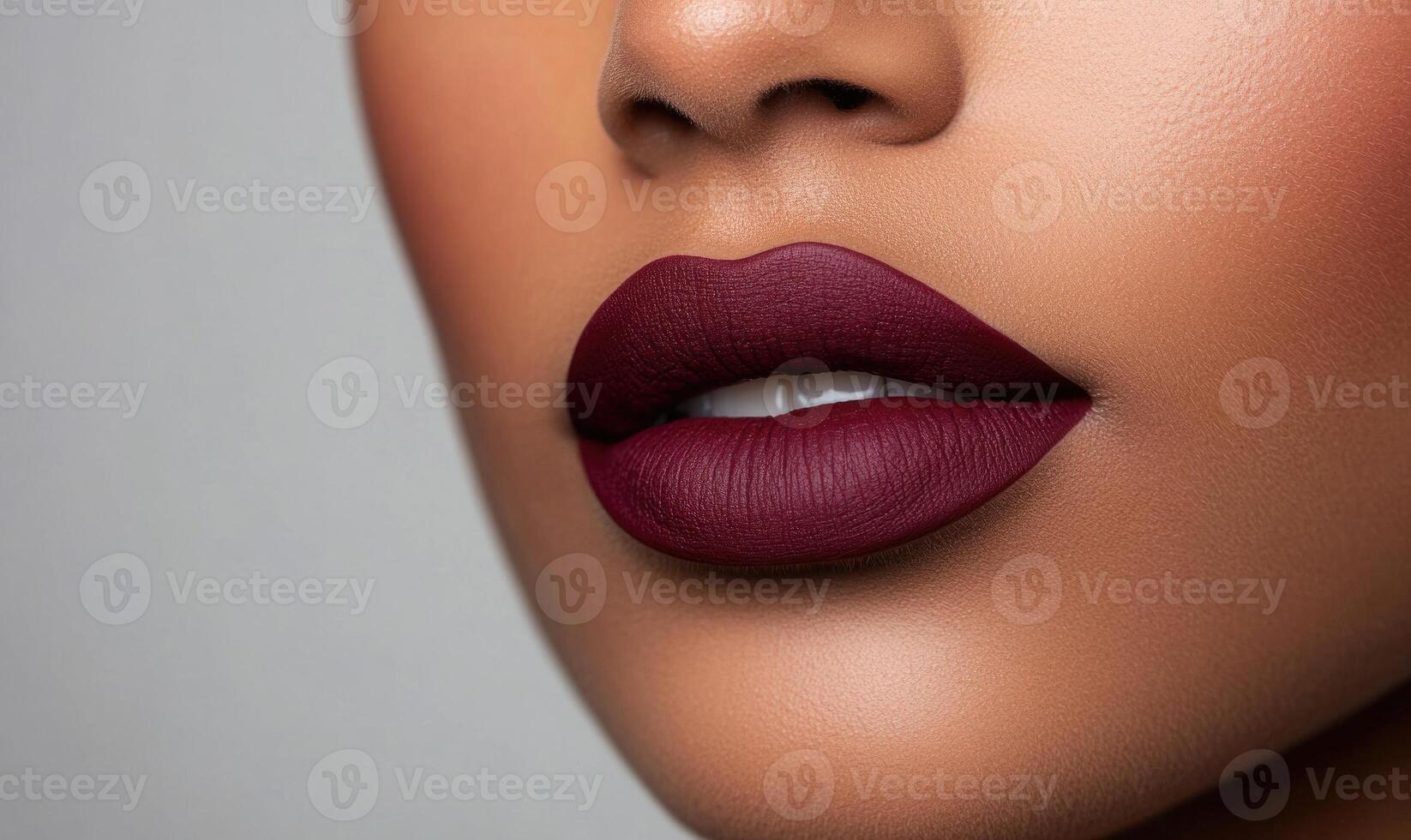 A woman with a red lip is shown in a close up photo