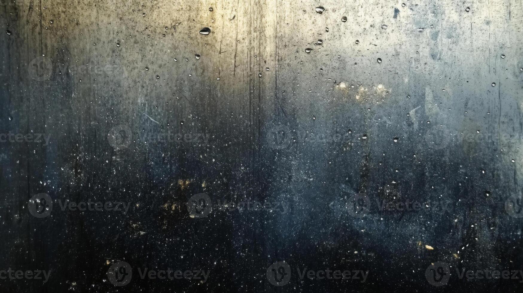 A close-up view of water droplets on a dark, textured surface. photo