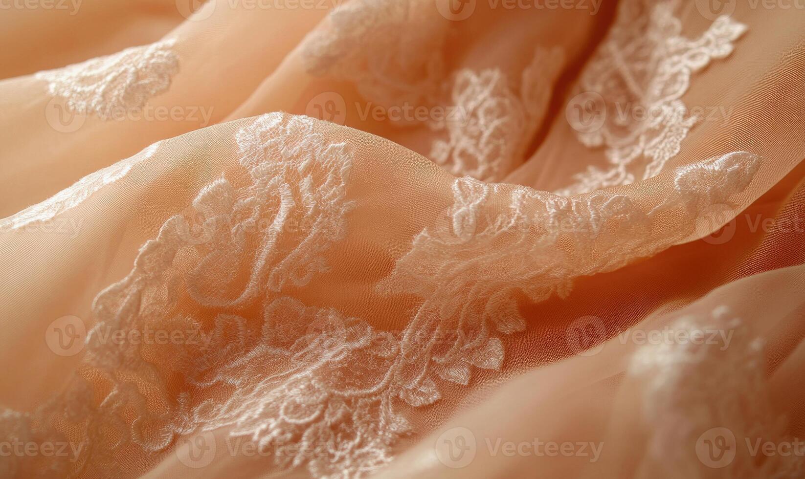 A close up of a piece of lace fabric with a floral pattern photo