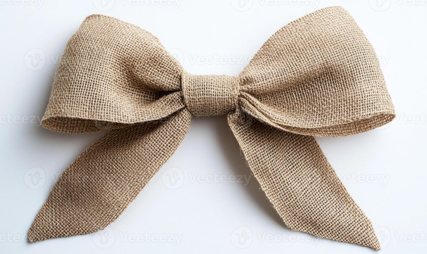 A brown ribbon with a bow is shown on a white background photo