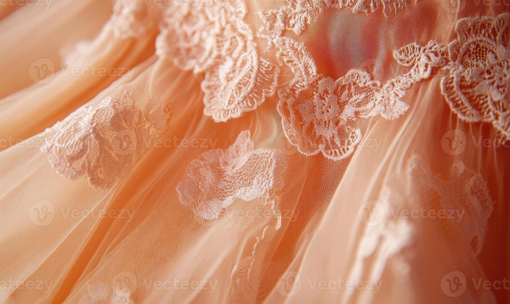 A close up of a pink lace dress photo