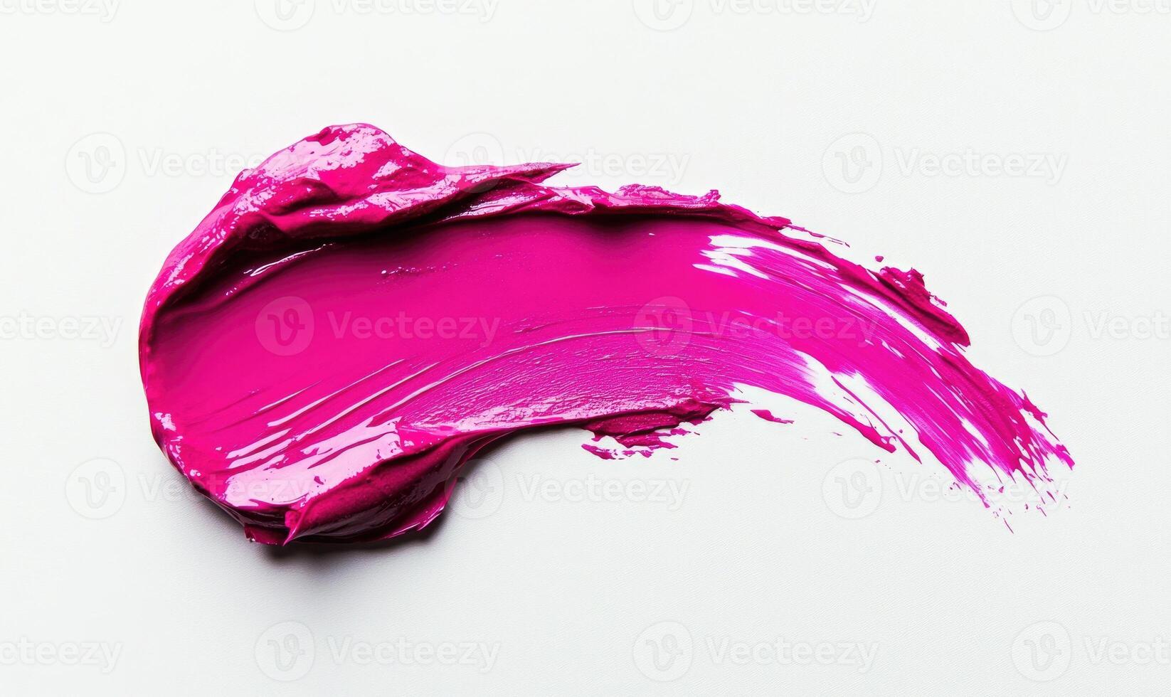 A pink lip stain is shown on a white background photo