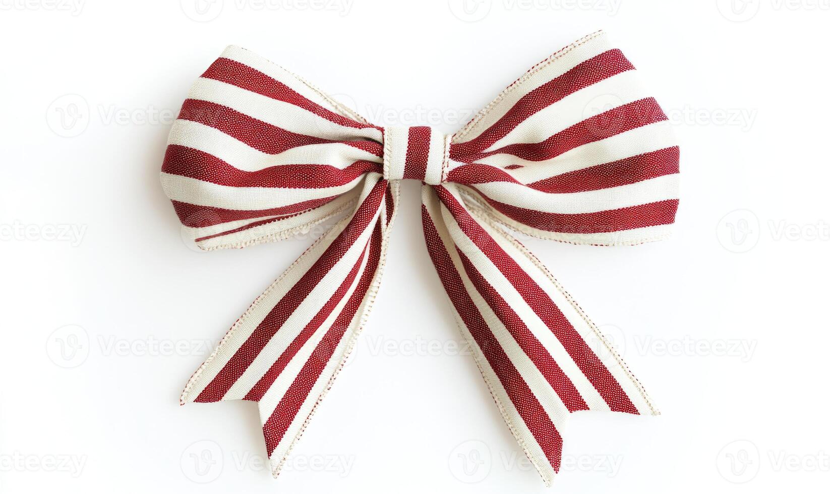 A red and white ribbon bow is displayed on a white background photo