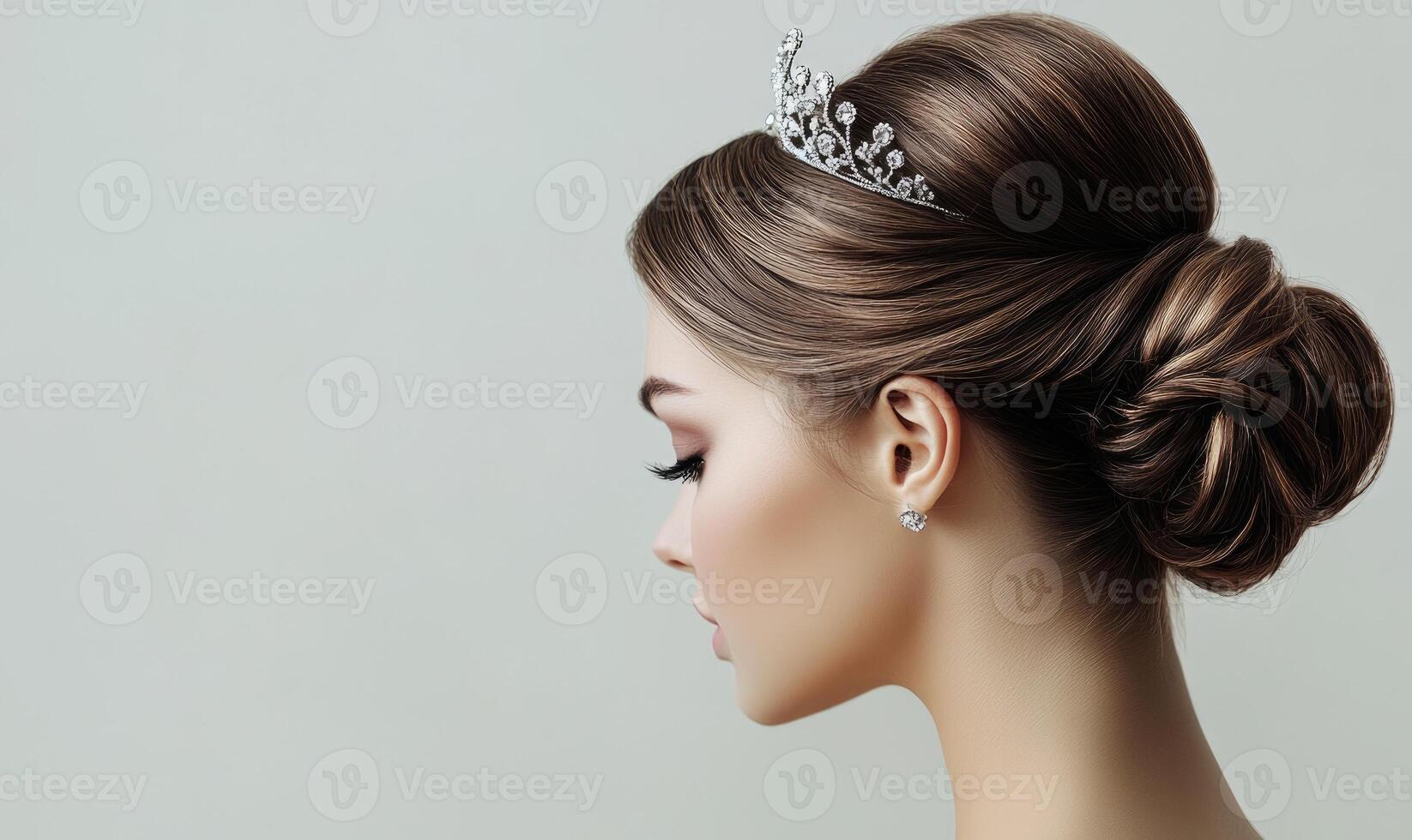 A woman with a tiara on her head photo