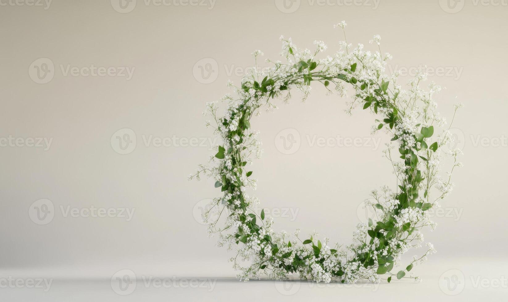 A white flower arrangement in the shape of a circle photo