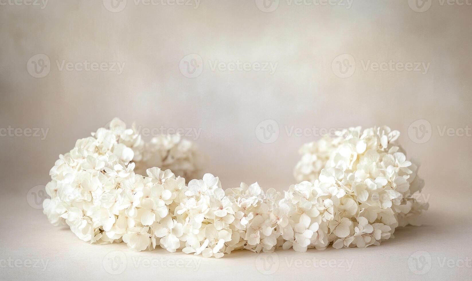 A white flower arrangement is displayed on a white background photo