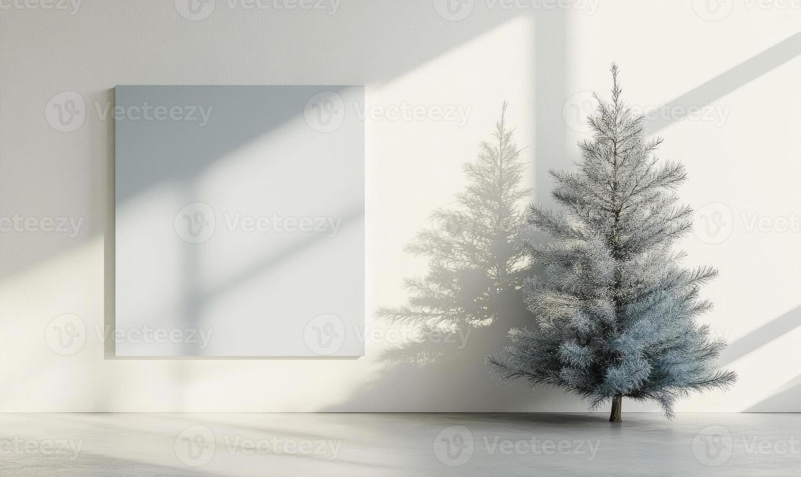 A white wall with a large empty frame and a small tree in the foreground photo