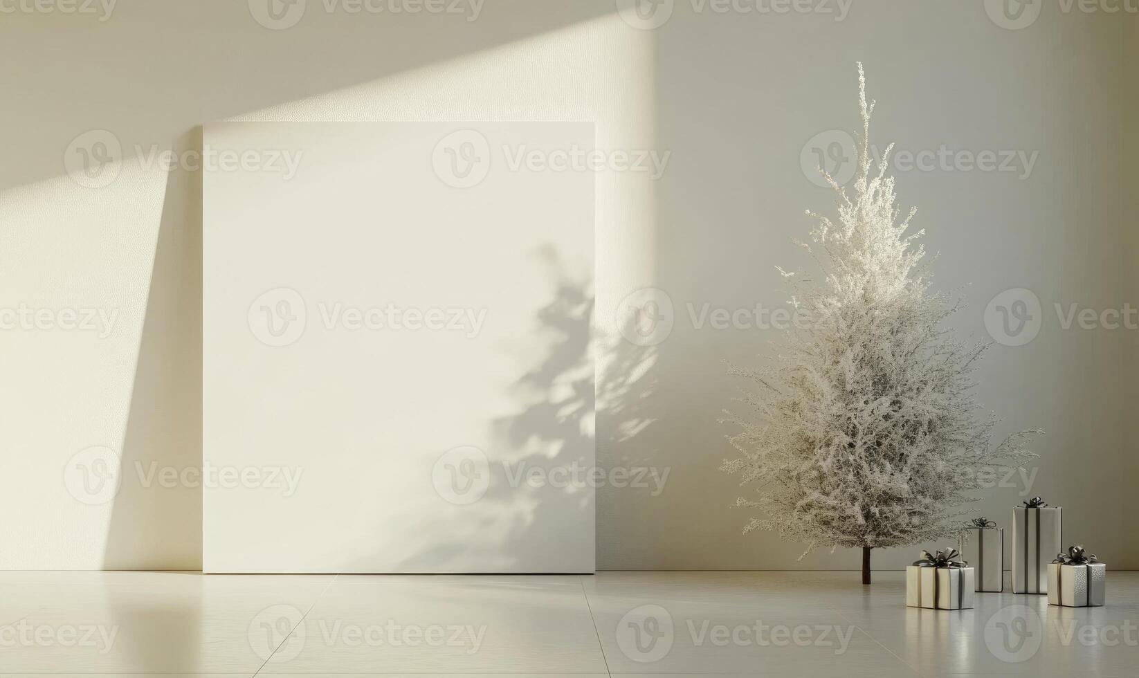 A white Christmas tree is in front of a white wall photo