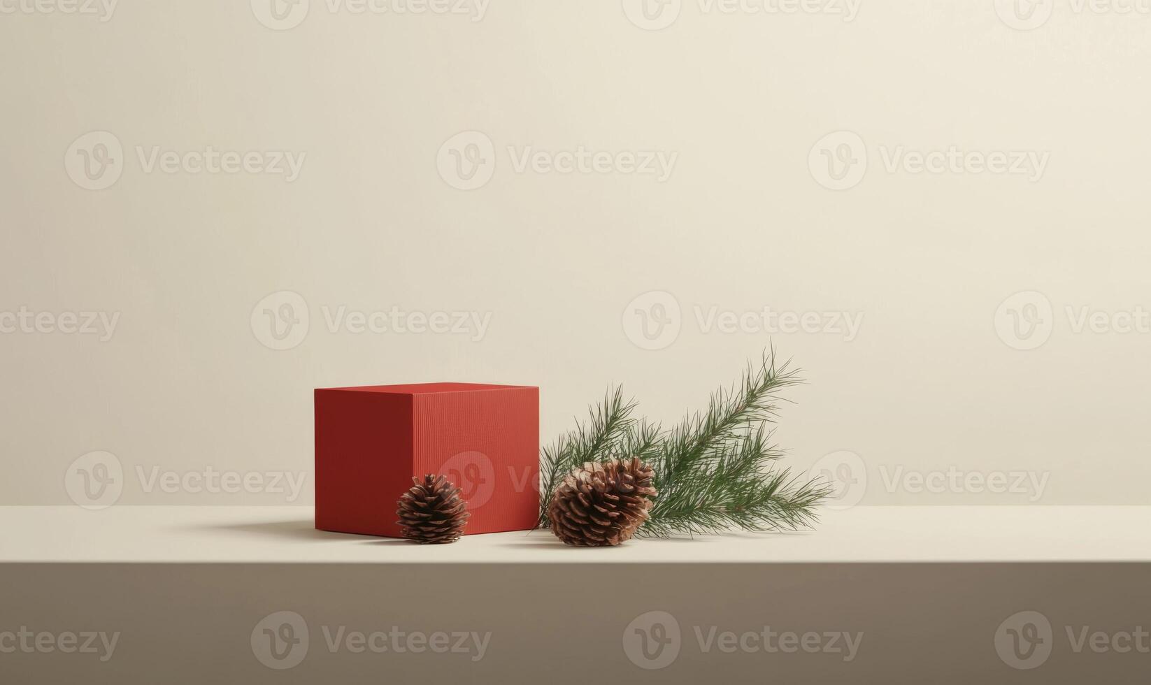 A red box with pine cones on top of it photo