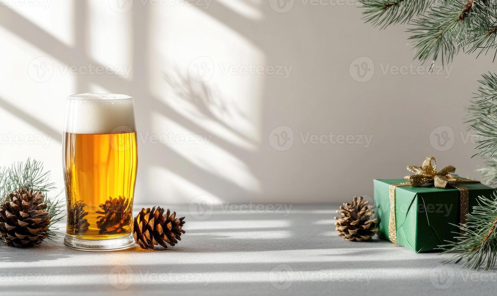 A glass of beer is on a table with pine cones and a green box photo