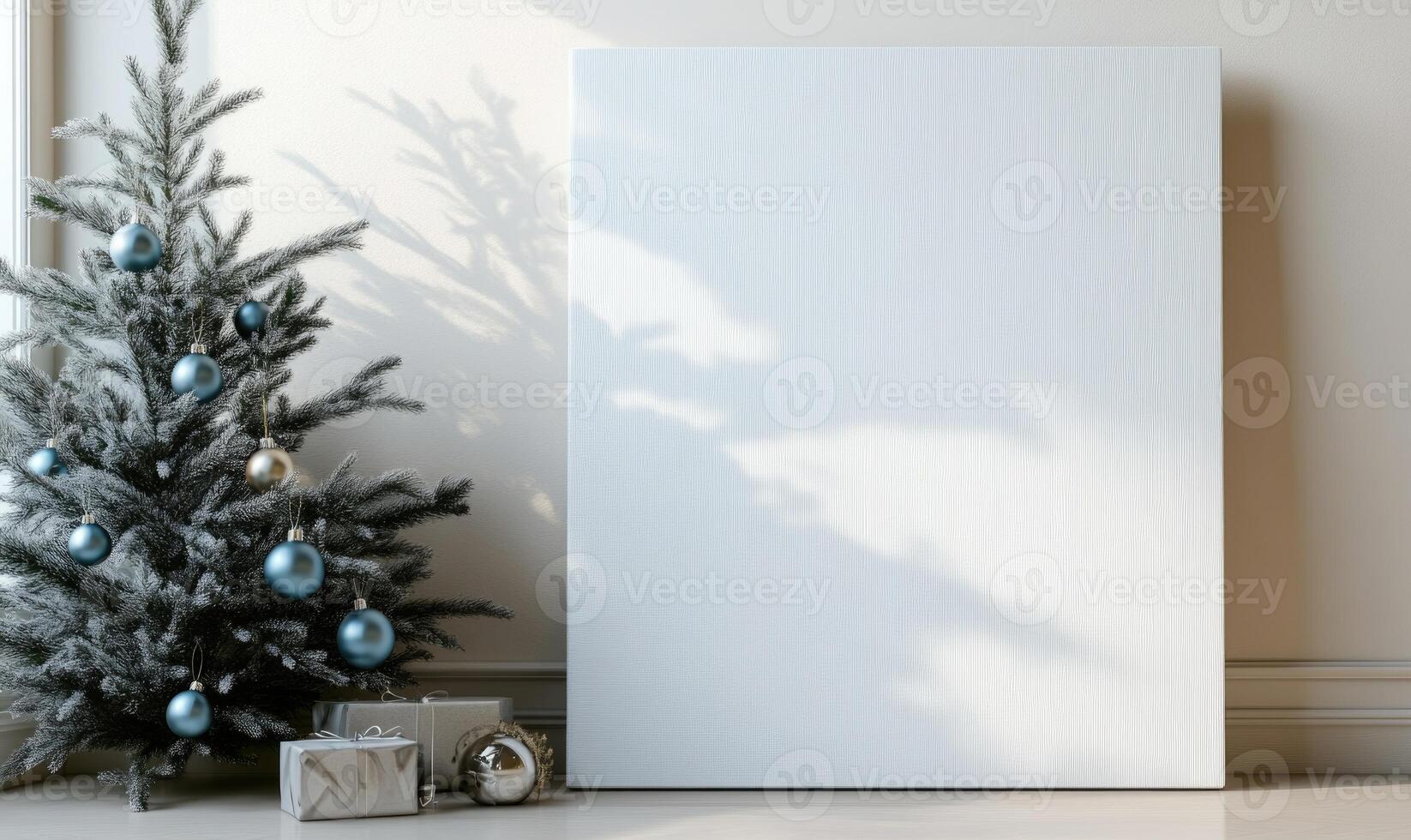A white framed picture sits in front of a Christmas tree photo