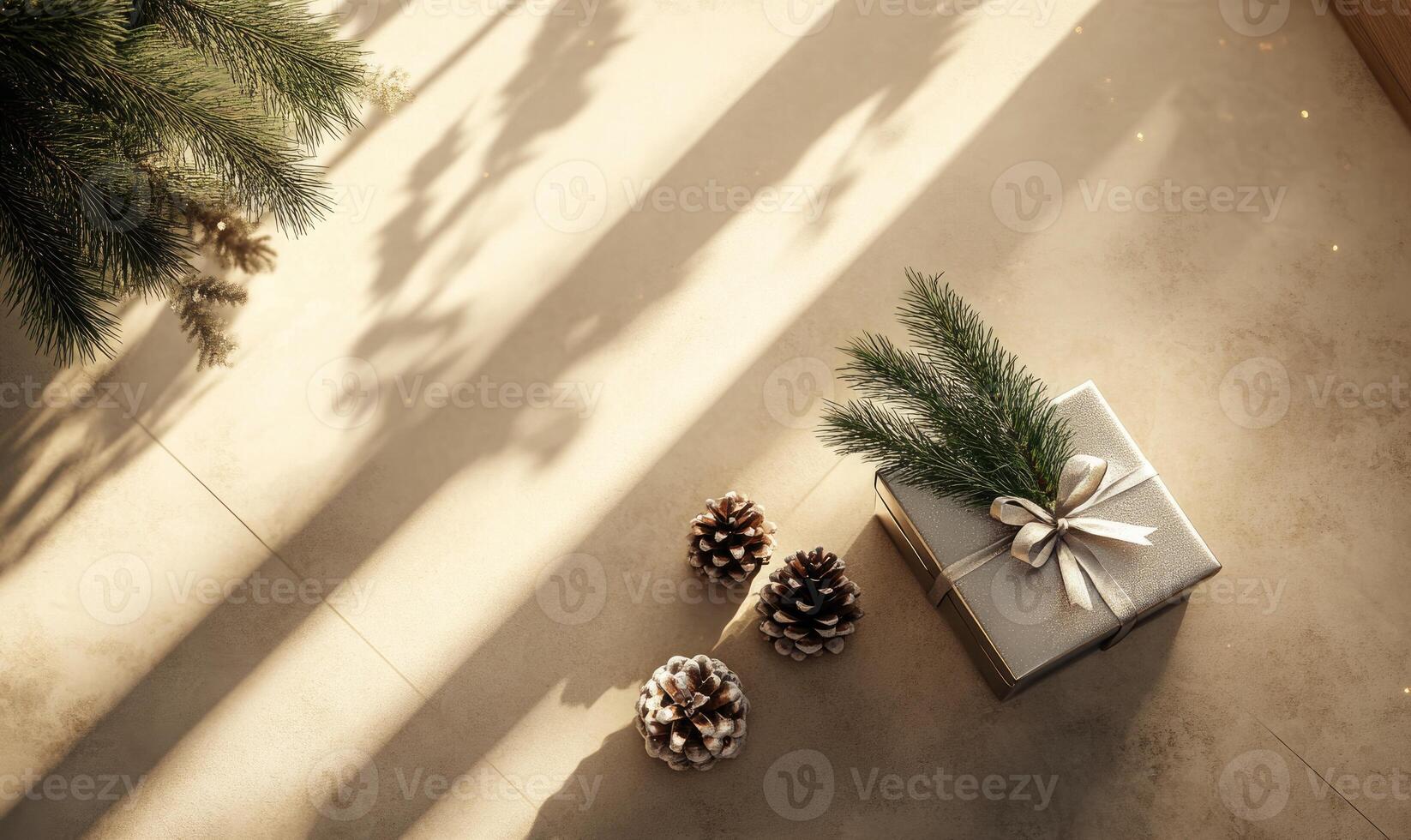 A box with a bow on top of it is on a table photo