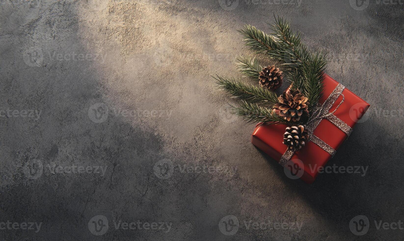 A red box with pine cones on top of it photo
