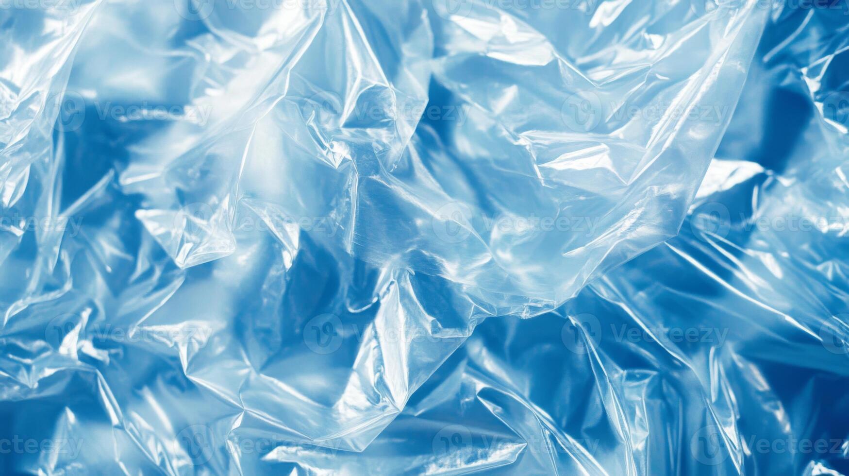 Abstract Texture of Wrinkled Blue Plastic Wrap photo