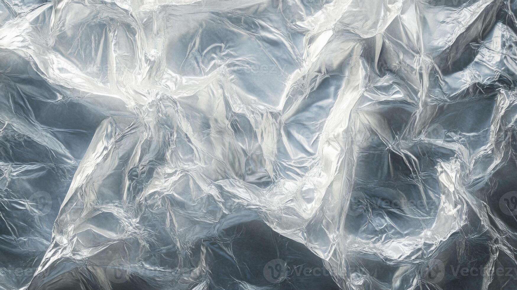Crumpled Silver Foil with Light Reflection photo