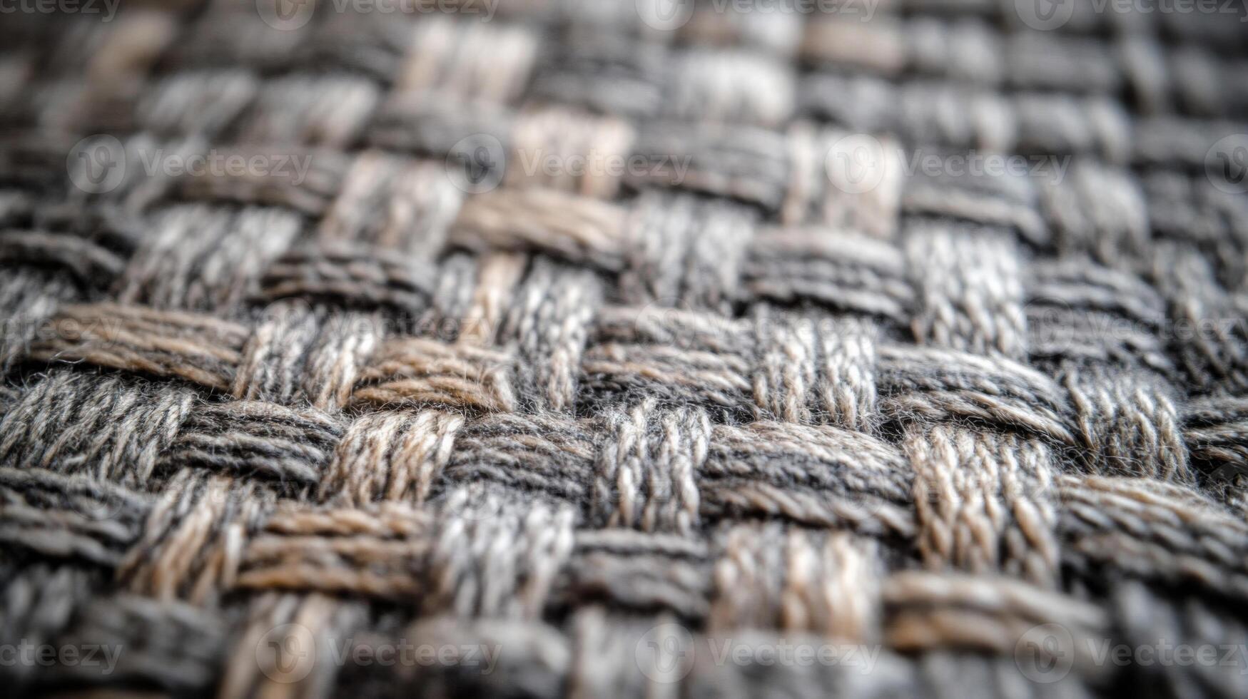 Close-up of Interwoven Grey and Tan Threads Forming a Woven Pattern photo